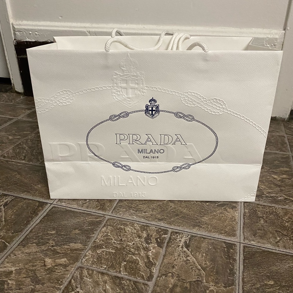 Empty Prada shopping bag